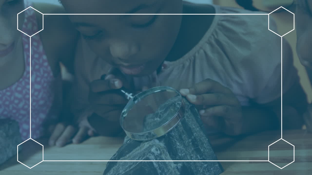 Animation of connected hexagons over diverse students looking at object through magnifying glass