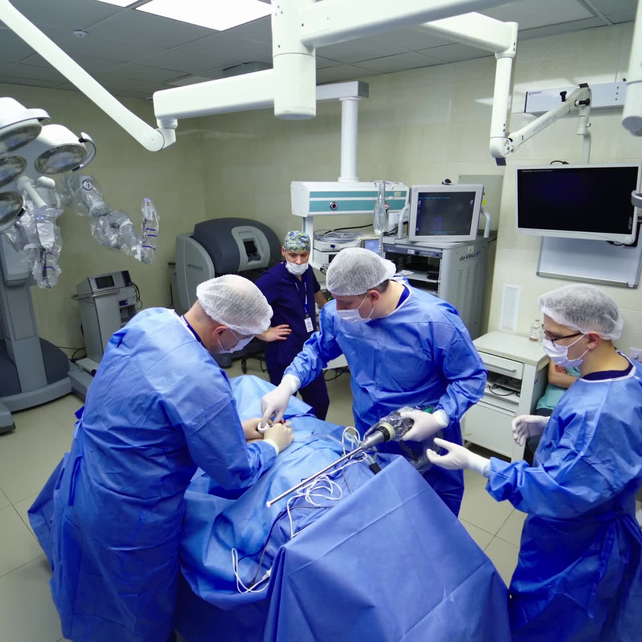 Da Vinci Surgical System. Medical robot operation involving robot performing surgery