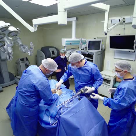 da vinci surgical system. medical robot operation involving robot performing surgery