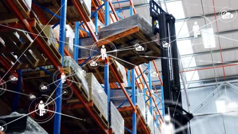 Animation-of-connected-icons-over-low-angle-view-of-forklift-placing-boxes-in-rack-at-warehouse