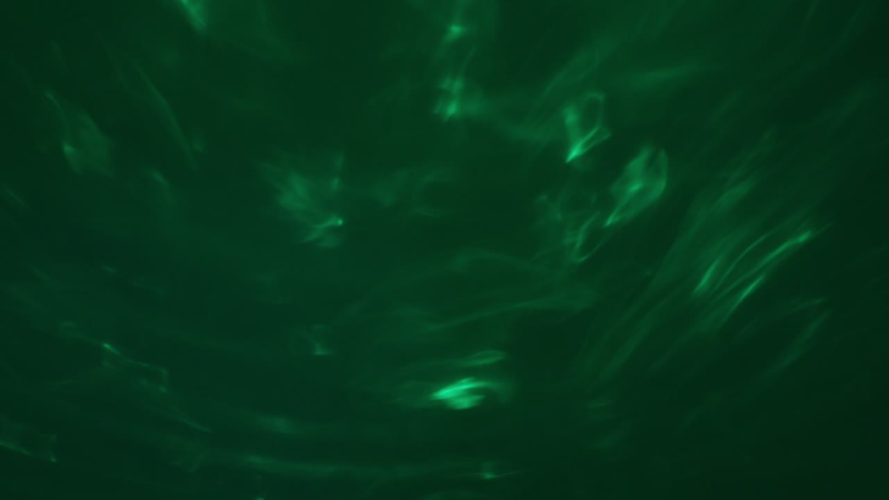 fondo abstracto verde. humo retorcido, formas fluidas al azar