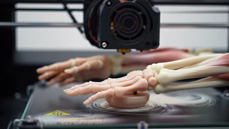 a cutting-edge 3d printer in action, crafting a detailed human hand model with realistic anatomy, showcasing the fusion of technology and artistry
