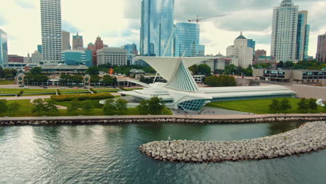 aerial drone shot of milwaukee's stunning lakefront city and art museum