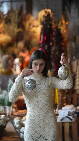 woman shopping for christmas ornaments