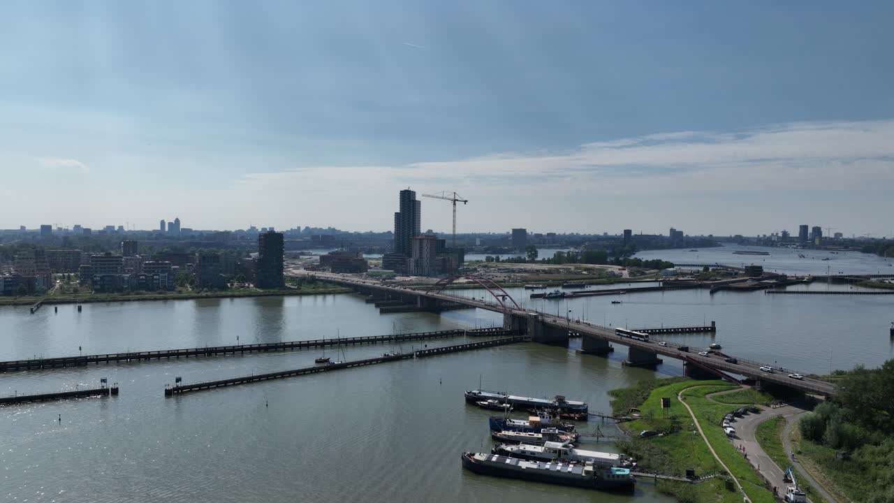 Schellingwouderbrug, and new build resdential tower in Amsterdam, The Netherlands. Aerial droen video