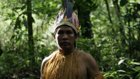 Portrait-shot-of-an-indigenous-man-in-the-dense-jungle-in-Leticia,-Amazon-area,-Colombia