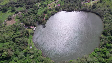 tranquil san carlos lake surrounded by lush greenery, aerial view