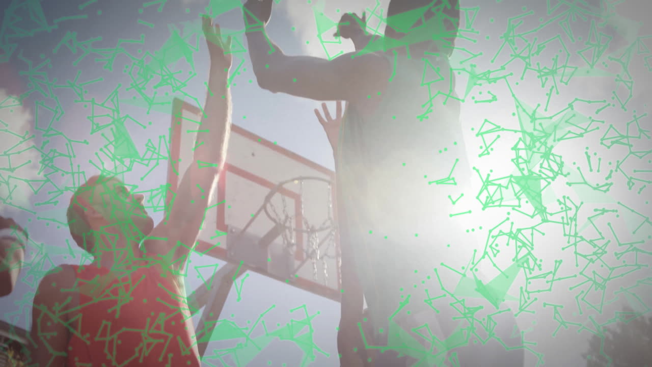 Basketball players jumping near hoop with green geometric animation overlay