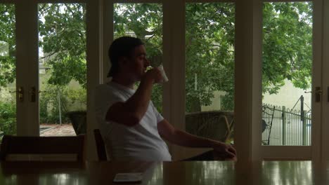 savoring a moment, sip by sip, with a warm cup of coffee in a cozy setting