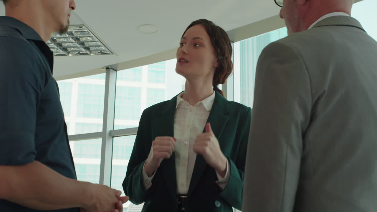 Three Entrepreneurs Negotiating about Business Low Angle