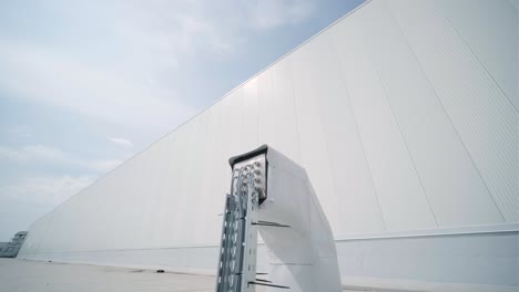 the air conditioning and ventilation system of a large industrial facility is located on the roof. it includes an air conditioner, smoke exhaust, and ventilation.