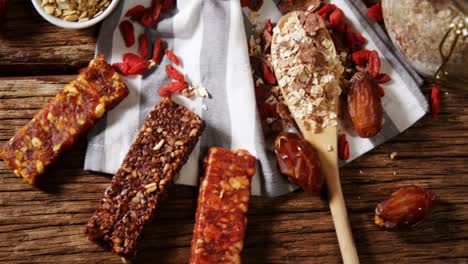 granola bar and honey on wooden table 4k