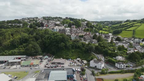 Launceston-Cornwall-aerial-view,-houses-on-hill