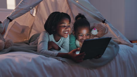 Bed,-night-and-girls-with-a-tablet