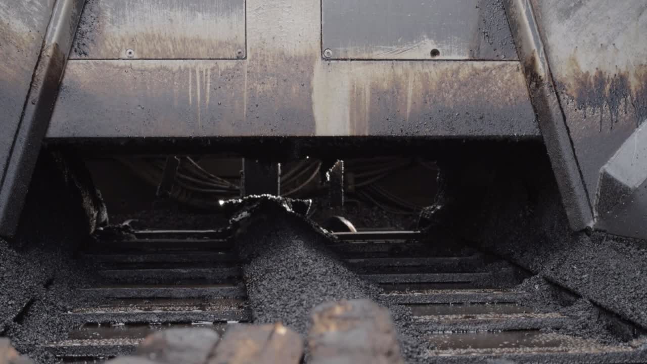 Asphalt paver heavy plant machine close up