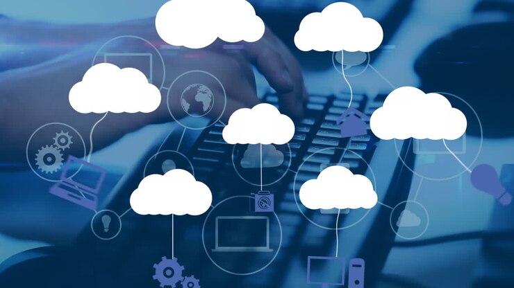 Animation of clouds with media icons and hands of businessman typing