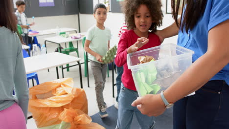 in school, children participating in recycling activity with teacher in classroom