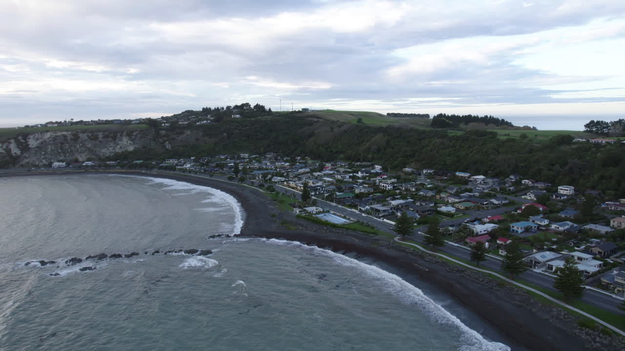 Aerial view overlooking the Kaikoura town and beach, cloudy day in New Zealand