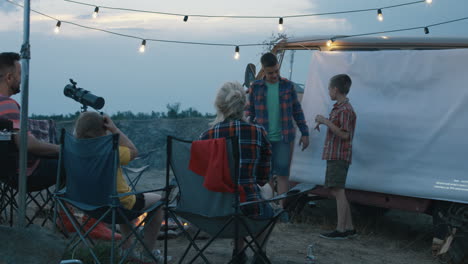 family camping trip at dusk
