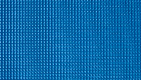 blur square pattern of soft plastic mat.