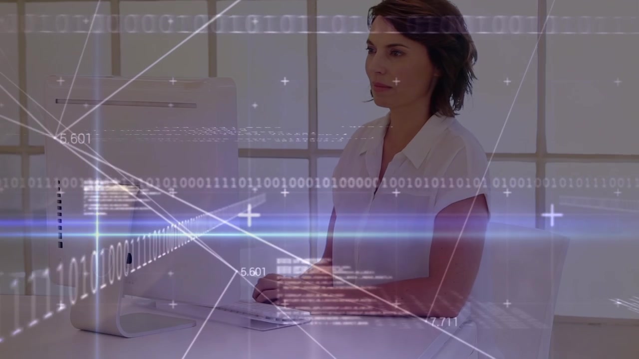 Professional Woman Working on Computer with Digital Data Overlay