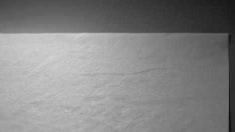 subtle grey textured background with shallow depth of field