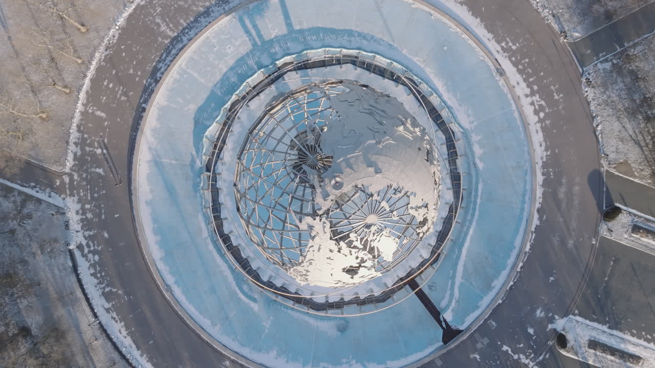 Aerial view of The Unisphere in Flushing Meadows Corona Park. Shot on a winter morning in Queens, New York City.