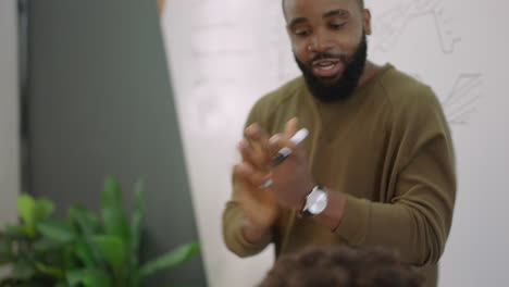 african-american-businessman-celebrating-successful-corporate-victory-team-leader-high-five-colleagues-clapping-in-boardroom-presentation-meeting-close-up