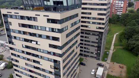 two urban looking high rise residential buildings that are renovated to european standard