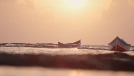 boat floating in the beautiful sunset