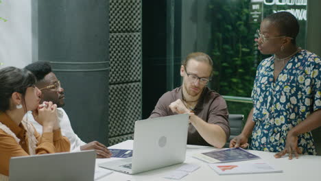 business team having meeting in coworking room