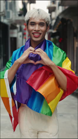 Proud LGBTQ+ Person with Rainbow Flag