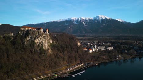 aerial boom shot reveals bled castle in slovenia