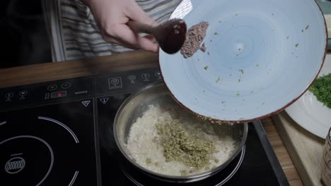 Prepare-a-mixture-of-Cafe-de-Paris-butter-and-spices-in-the-pan,-enhancing-the-flavor-of-the-meat-sauce