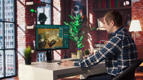 man looking at cad software interface on pc, making home floor plans