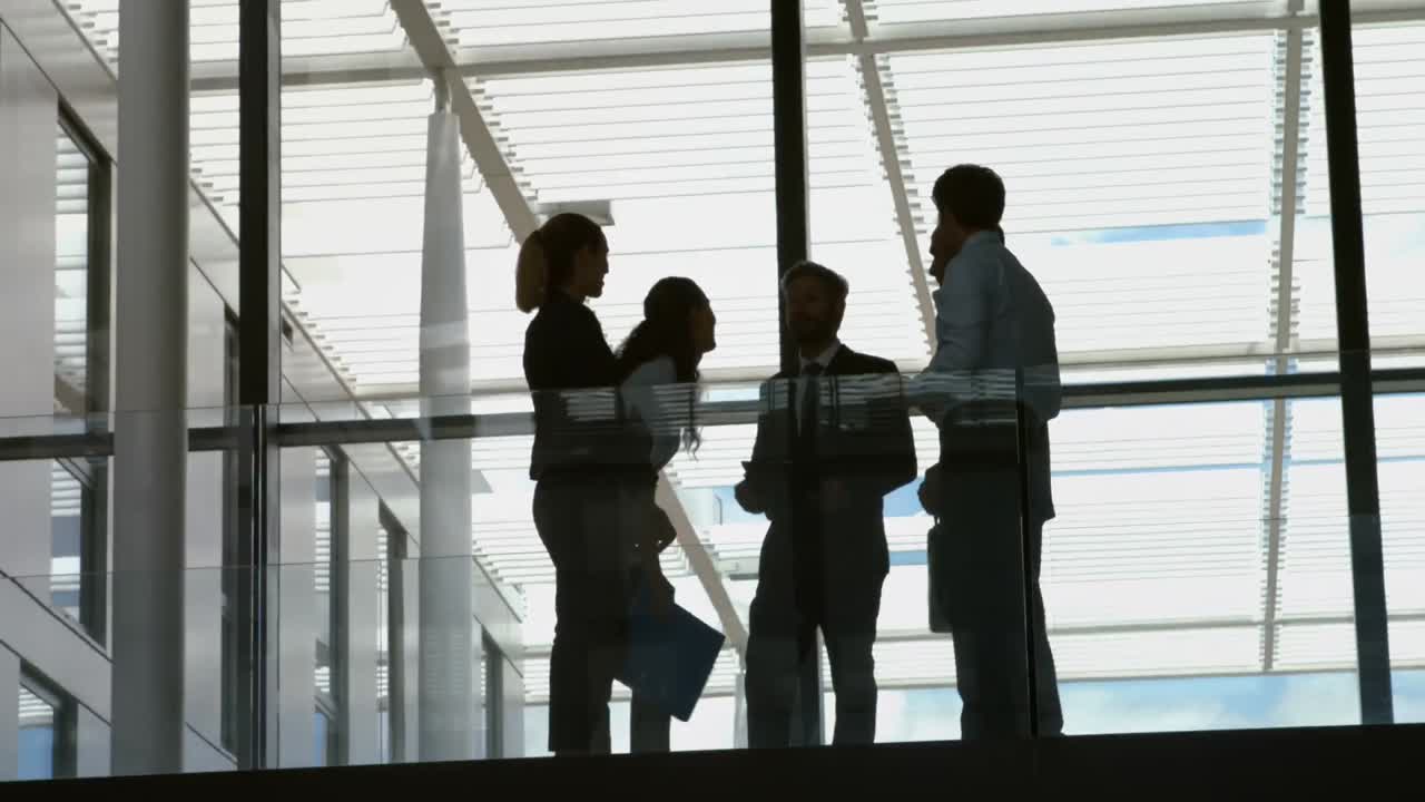 Business people interacting with each other