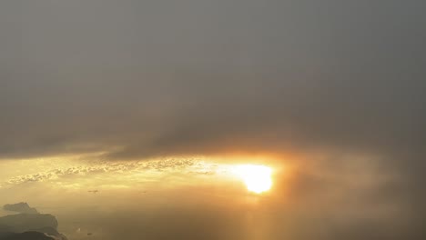 awesome sunset over the mediterranean sea, flying over mallorca island, spain