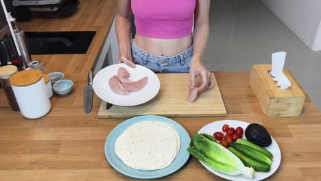 preparing chicken wraps