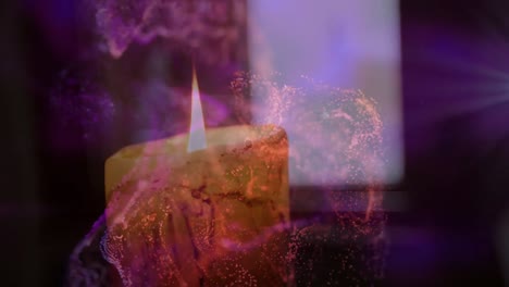 animation of light spots and shapes over candle