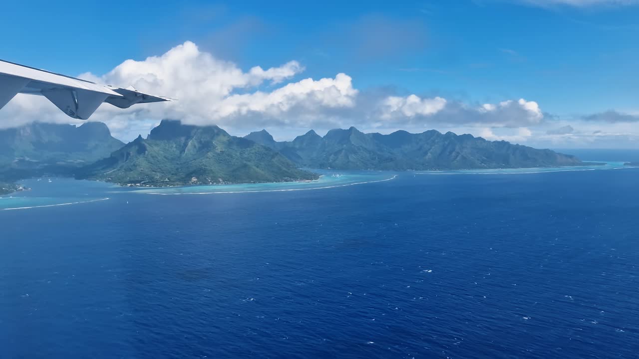 Moorea Island, French Polynesia, Airplane Passenger POV of Scenic Coastline and Lagoon