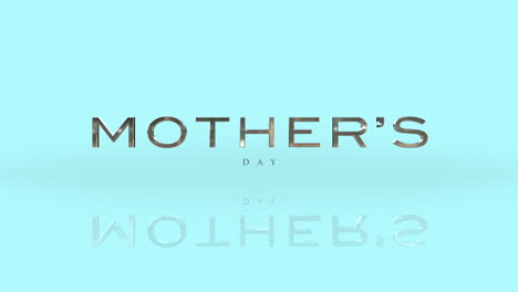 golden text on light blue celebrating mothers day logo