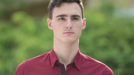 young handsome businessman thinking in the streets outdoors