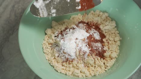 Prepping-flour-batter-for-vegan-pumpkin-muffins-using-real-roasted-pumpkin-in-bowl-healthy-dairy-free-recipe-vegan