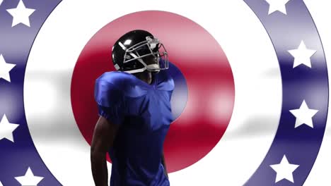 african american male rugby player wearing a helmet against stars on spinning circles