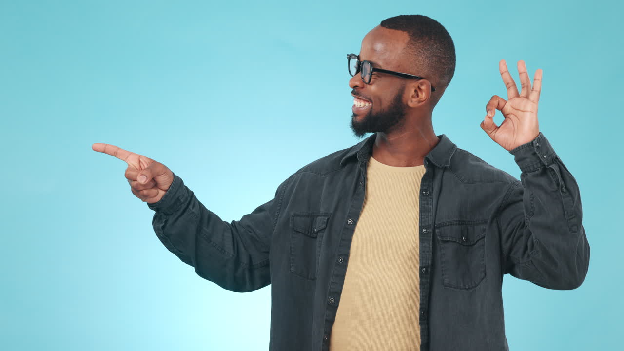 Pointing, choice and face of black man in studio