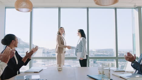 business women shaking hands in boardroom meeting successful corporate partnership deal with handshake colleagues clapping hands welcoming opportunity for cooperation in office 4k