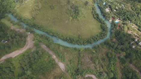 Drone-aerial-bird's-eye-view-of-river-Cahabon-near-Semuc-Champey-area-in-Lanquin,-Guatemala