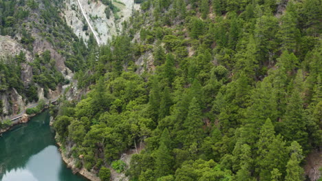 Wonders-of-Plumas-National-Forest-California-cliff-edge-aerial-pan