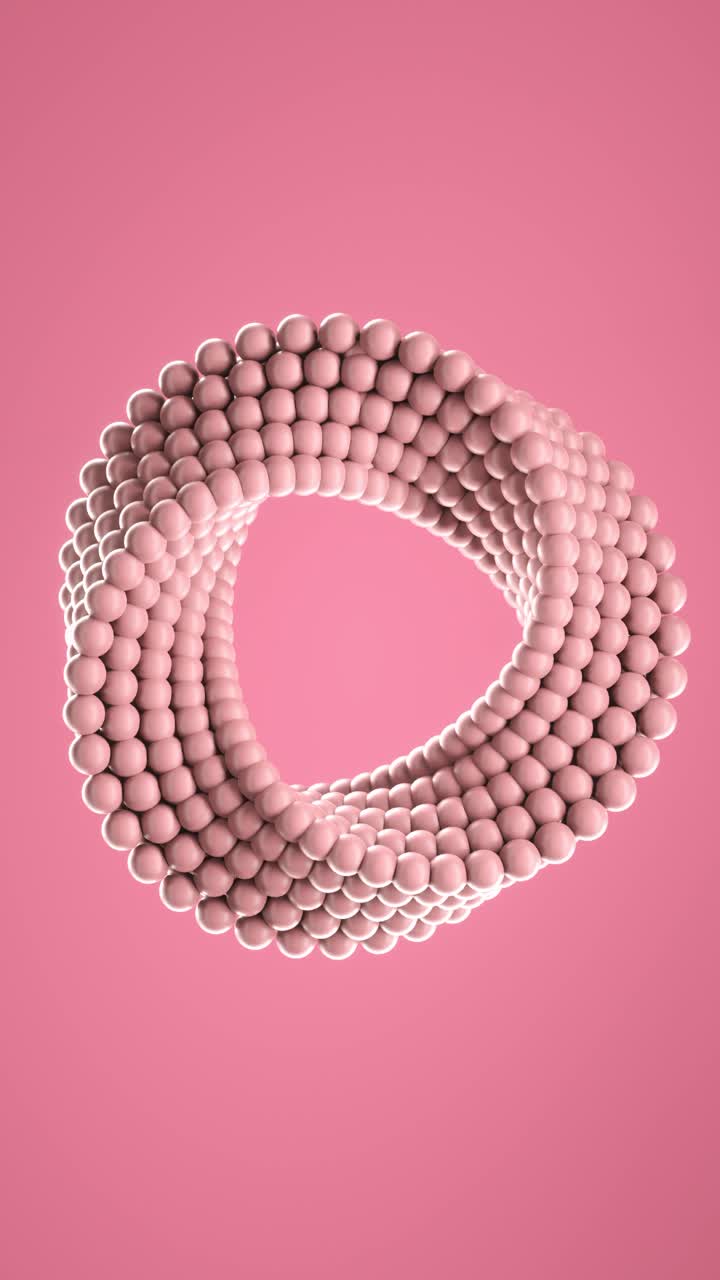 3D loop animation of spinning balls molded into uneven circle. Vertical background