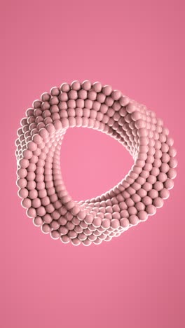3d loop animation of spinning balls molded into uneven circle. vertical background